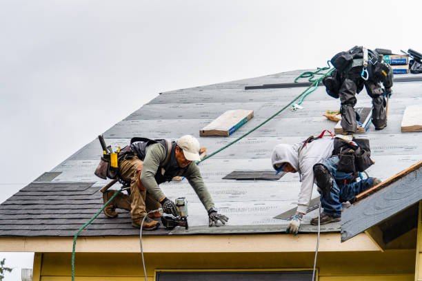 Professional Gutter Installation technician working in Peabody, MA